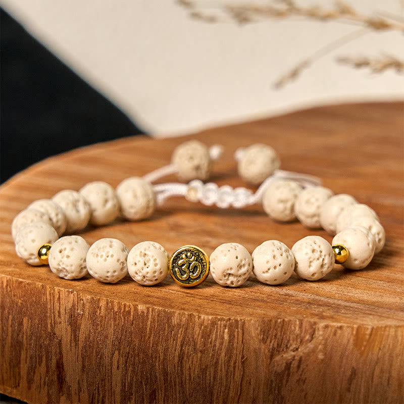 Pulsera de piedra de lava blanca con símbolo Om y Buddha Stones para la calma y la curación - image 2