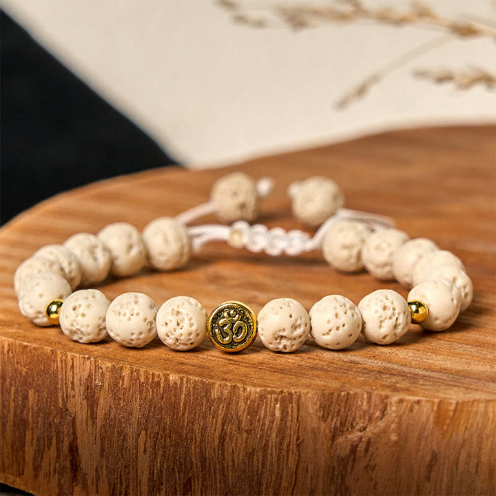 Pulsera de piedra de lava blanca con símbolo Om y Buddha Stones para la calma y la curación - image 2