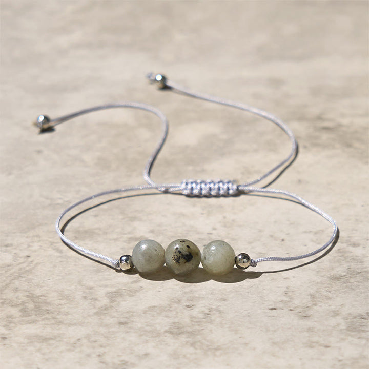 Pulsera curativa de cuerda con cuentas de labradorita natural de Buddha Stones - image 1