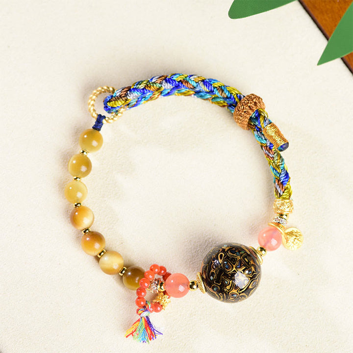 Pulsera de protección de ojo de tigre tejida a mano con cuentas de laca tibetana de Buddha Stones - image 2