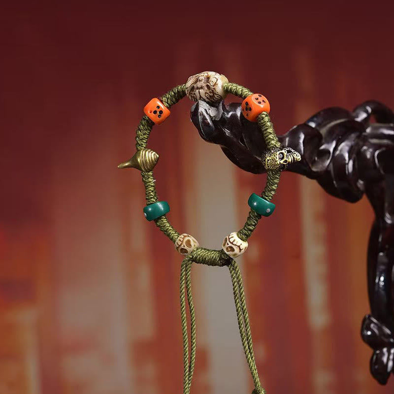 Pulsera de cuerda hecha a mano con dados y diseño de dragón tibetano de Buddha Stones - image 2