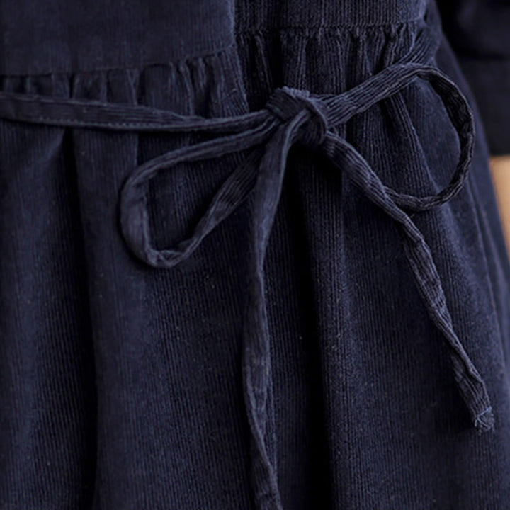 Vestido midi de pana de algodón, manga larga, cuello redondo, volantes y bolsillos con diseño de Buddha Stones , con cordones - image 9