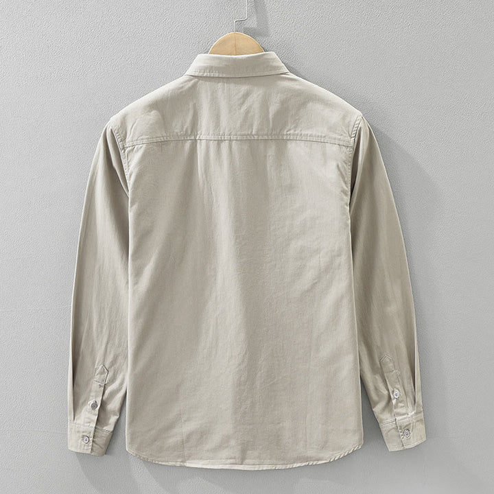 Camisa de algodón puro de manga larga para hombre con diseño de botones lisos y bolsillos de Buddha Stones Daily - image 1