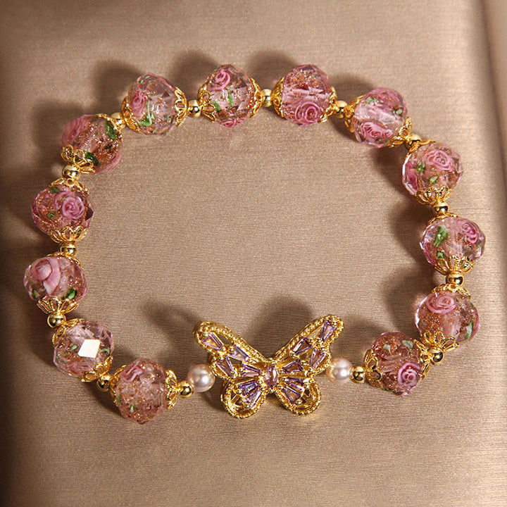 Pulsera de cristal rosa cálido con diseño de mariposa natural y Buddha Stones - image 3