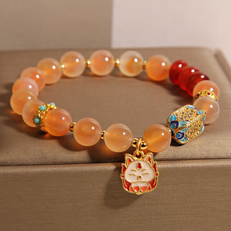 Pulsera curativa de ágata naranja y caramelo con zorro de nueve colas de Buddha Stones - image 1