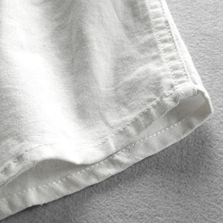 Camisa de manga larga de algodón y lino con cuello redondo y diseño ajustado para hombre de Buddha Stones. - image 8