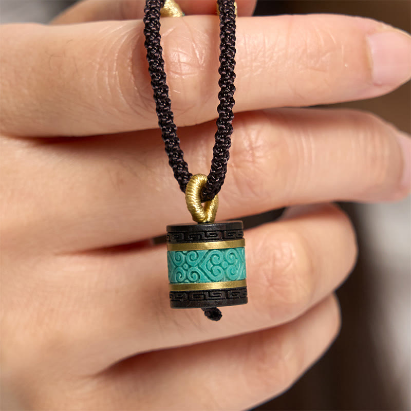 Collar con colgante de paz con cilindro de turquesa y madera de ébano con Buddha Stones - Madera de ébano - image 0