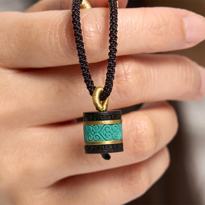 Collar con colgante de paz con cilindro de turquesa y madera de ébano con Buddha Stones - Madera de ébano - image 0