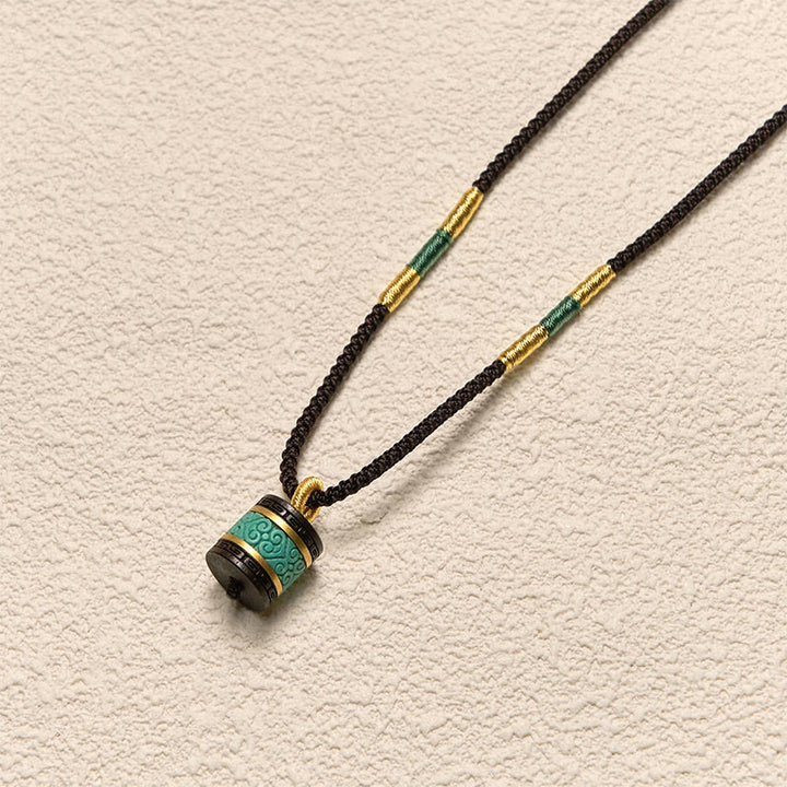 Collar con colgante de paz con cilindro de turquesa y madera de ébano con Buddha Stones - image 3