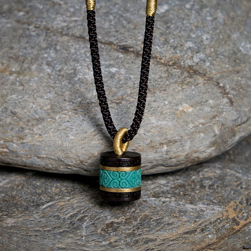 Collar con colgante de paz con cilindro de turquesa y madera de ébano con Buddha Stones - image 1