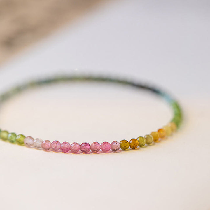 Pulsera con cuentas ultrafinas de turmalina natural de 2,5 mm y Buddha Stones - image 1