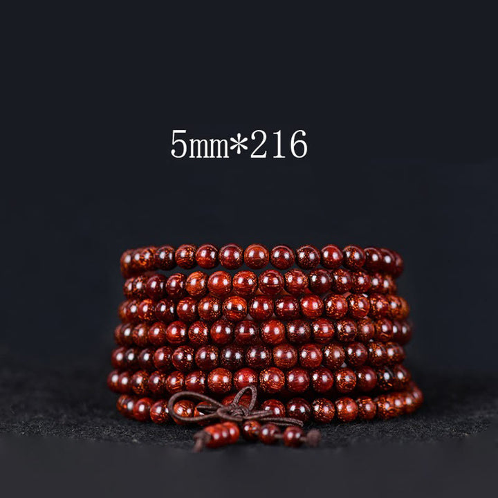 Pulsera de equilibrio de sándalo rojo con hoja pequeña tibetana de Buddha Stones - 5 mm x 216 - image 7