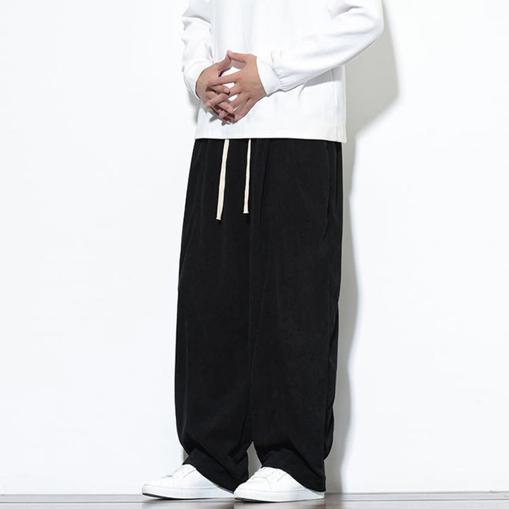 Pantalones harem para hombre de pana pura con cordón ajustable y estampado de Buddha Stones. - image 29