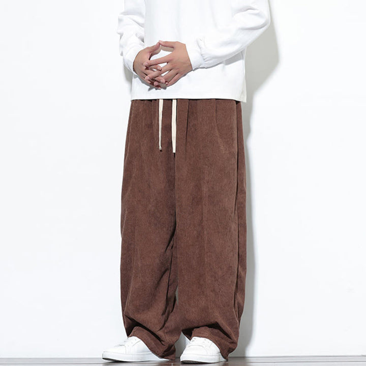 Pantalones harem para hombre de pana pura con cordón ajustable y estampado de Buddha Stones. - image 36