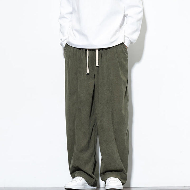 Pantalones harem para hombre de pana pura con cordón ajustable y estampado de Buddha Stones. - image 5