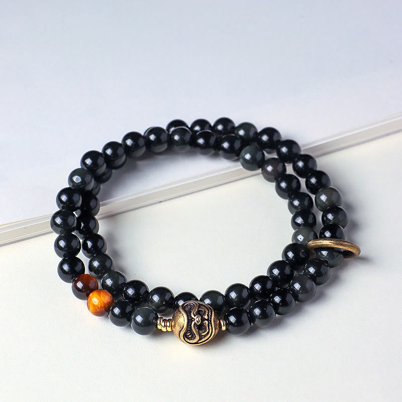 Pulsera de cobre con doble vuelta de obsidiana negra tibetana y ojo de tigre con Buddha Stones - Obsidiana negra (circunferencia de la muñeca: 13-15 cm) - image 0