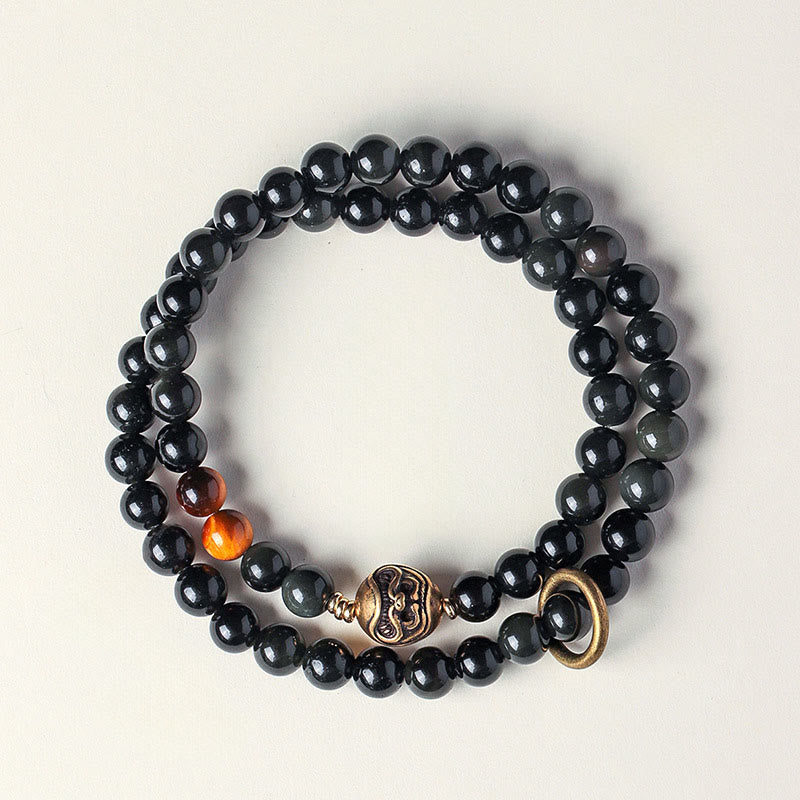 Pulsera de cobre con doble vuelta de obsidiana negra tibetana y ojo de tigre con Buddha Stones - image 1