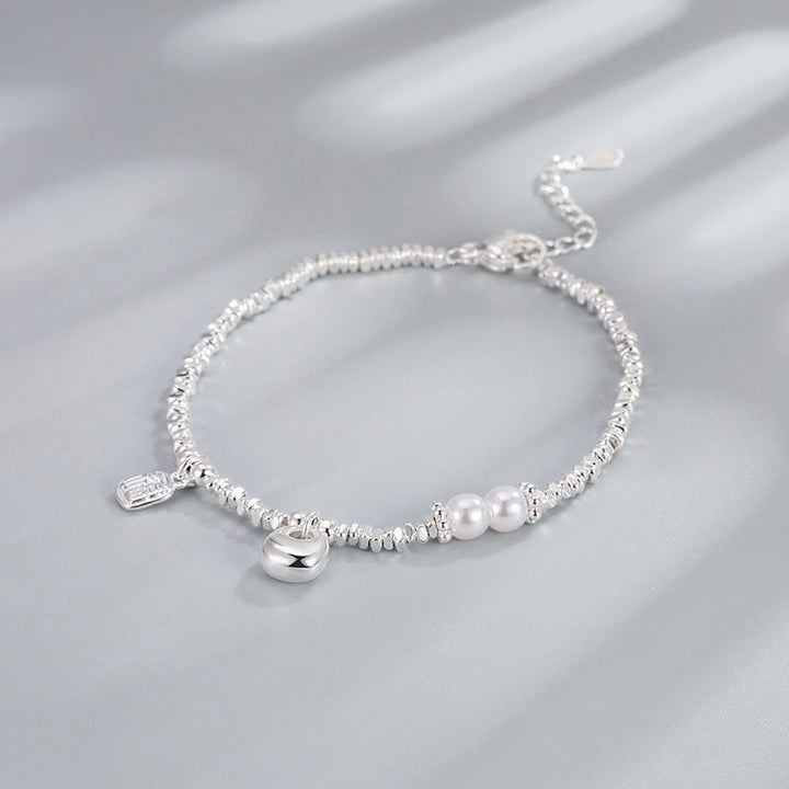 Pulsera de bendición con perla y monedero con símbolo Fu de plata bañada en cobre y Buddha Stones - image 1