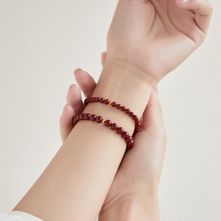 Pulsera de concentración con diseño simple de cinabrio y oro 999 de Buddha Stones - image 16