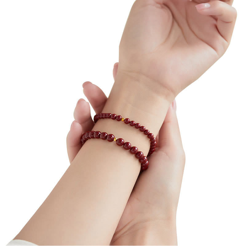 Pulsera de concentración con diseño simple de cinabrio y oro 999 de Buddha Stones - image 18