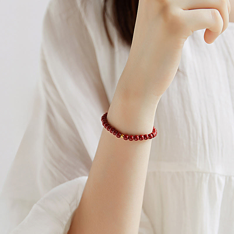 Pulsera de concentración con diseño simple de cinabrio y oro 999 de Buddha Stones - image 3