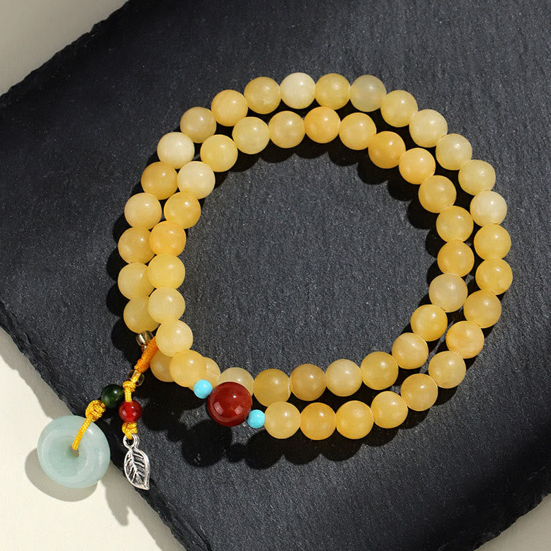 Pulsera de la riqueza con diseño de doble vuelta y hebilla de paz de topacio y Buddha Stones - image 1