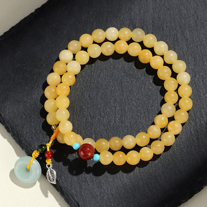 Pulsera de la riqueza con diseño de doble vuelta y hebilla de paz de topacio y Buddha Stones - image 1