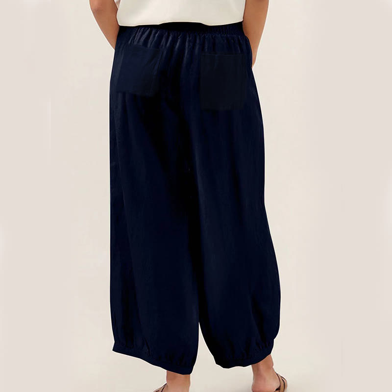 Pantalones harén para mujer con bolsillos y diseño de Buddha Stones en color liso - image 1