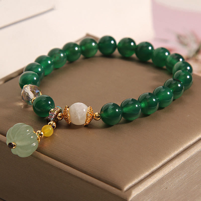 Pulsera relajante con cuentas de calabaza de cristal verde de Buddha Stones - image 1
