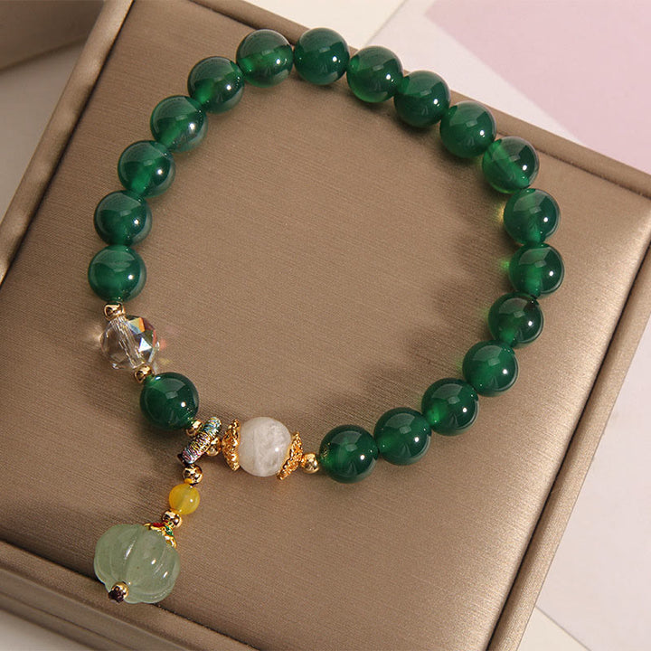 Pulsera relajante con cuentas de calabaza de cristal verde de Buddha Stones - image 3