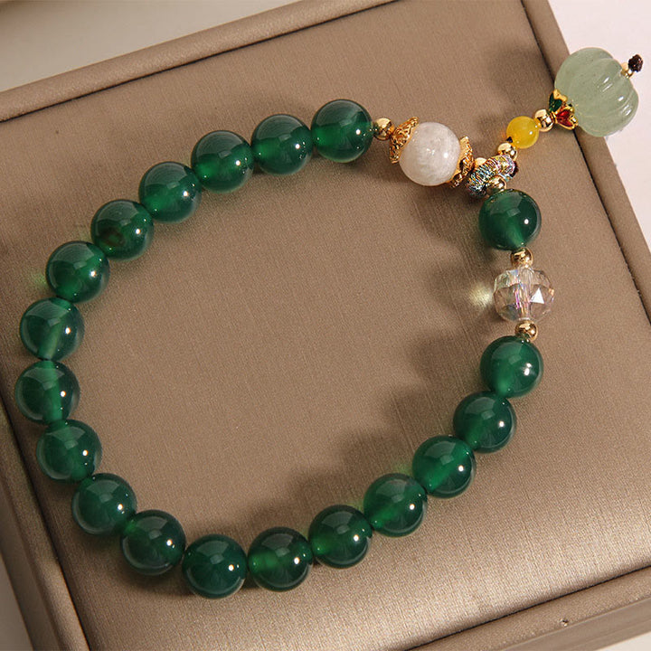 Pulsera relajante con cuentas de calabaza de cristal verde de Buddha Stones - image 4