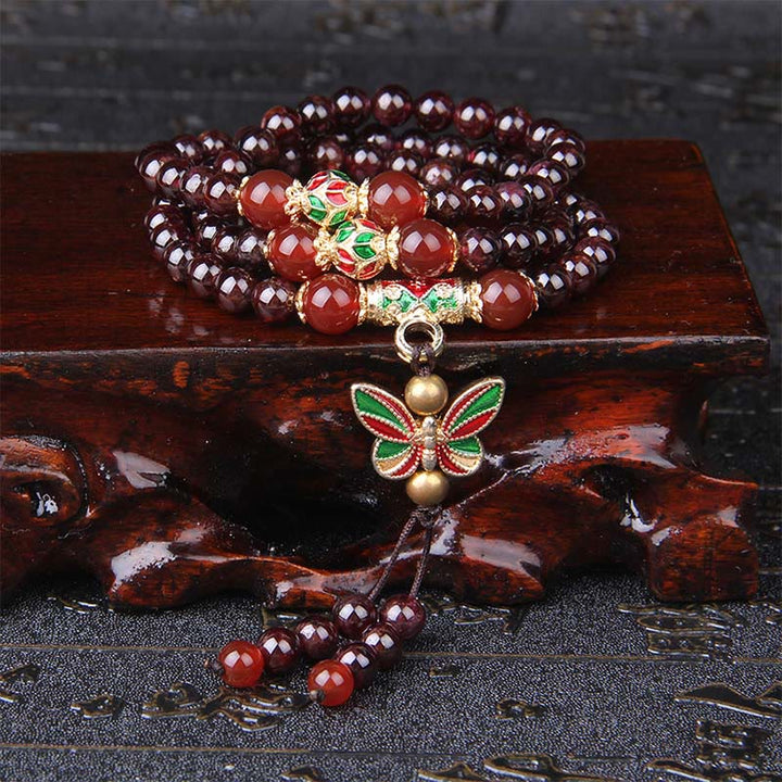 Pulsera multicapa de Buddha Stones con granate natural, ágata roja y mariposa colorida que purifica la calma. - image 1