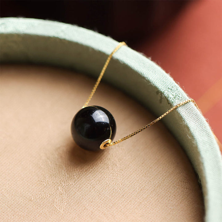 Collar con colgante de cuentas redondas de ámbar y piedras de Buddha Stones en plata de ley 925 que te hará sentir seguro. - image 1