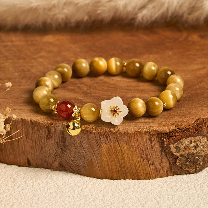 Pulsera de coraje con flor de campana y ojo de tigre dorado natural de Buddha Stones - Ojo de tigre y flor blanca (circunferencia de la muñeca: 14-16 cm) - image 0