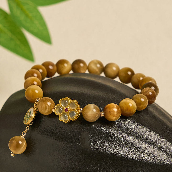 Pulsera de coraje con flor de campana y ojo de tigre dorado natural de Buddha Stones - image 6