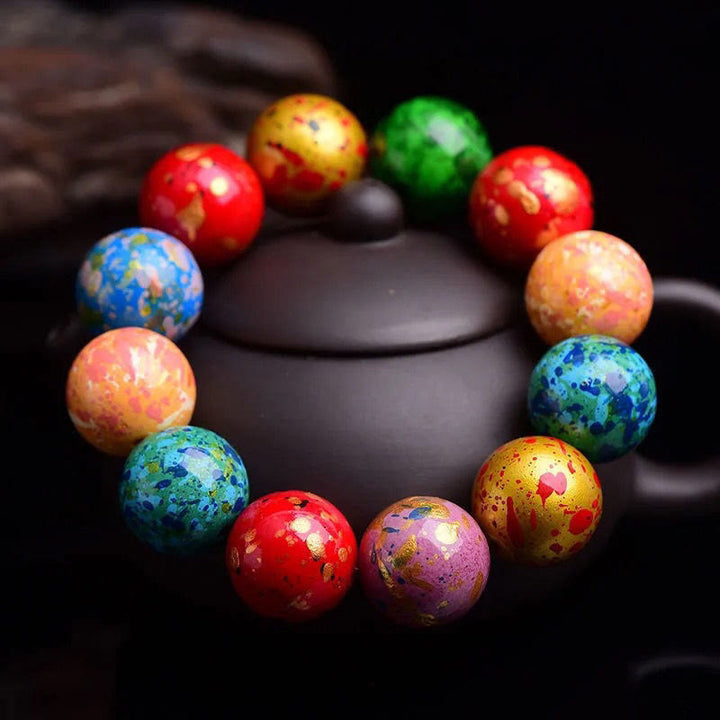 Pulsera de protección de cuentas de sándalo de una sola vuelta con laca multicolor de Buddha Stones - image 1
