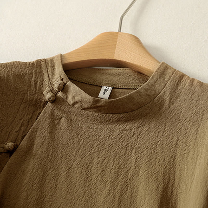 Camisa de algodón de manga larga para mujer con botones asimétricos y estampado de Buddha Stones en la parte delantera. - image 2