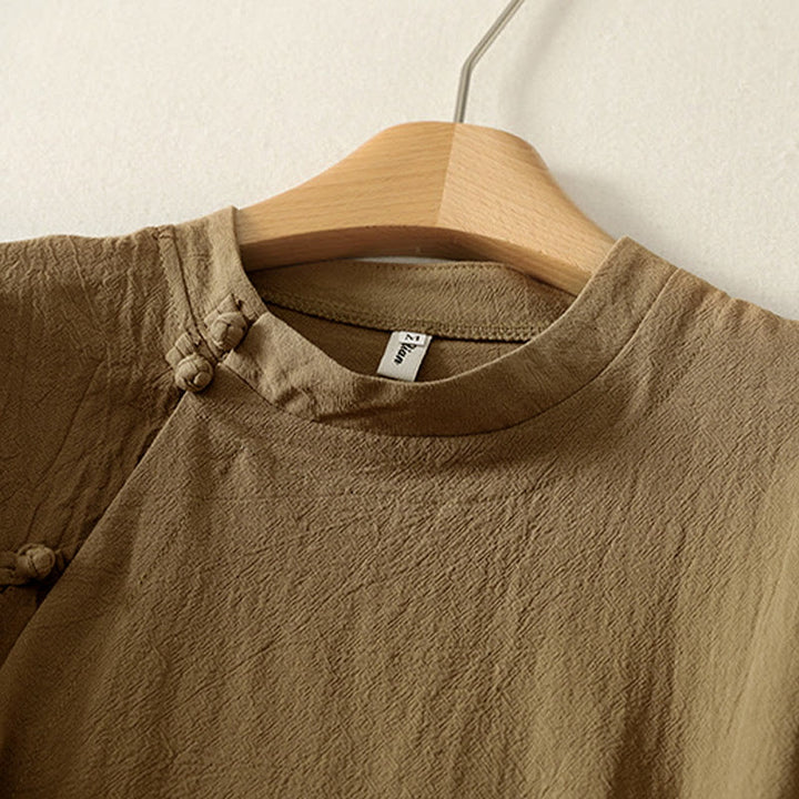 Camisa de algodón de manga larga para mujer con botones asimétricos y estampado de Buddha Stones en la parte delantera. - image 2