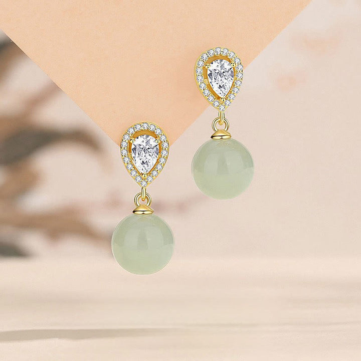 Pendientes de la prosperidad con cuentas de jade Hetian y diseño de gota de agua en plata de ley 925 con Buddha Stones - image 0