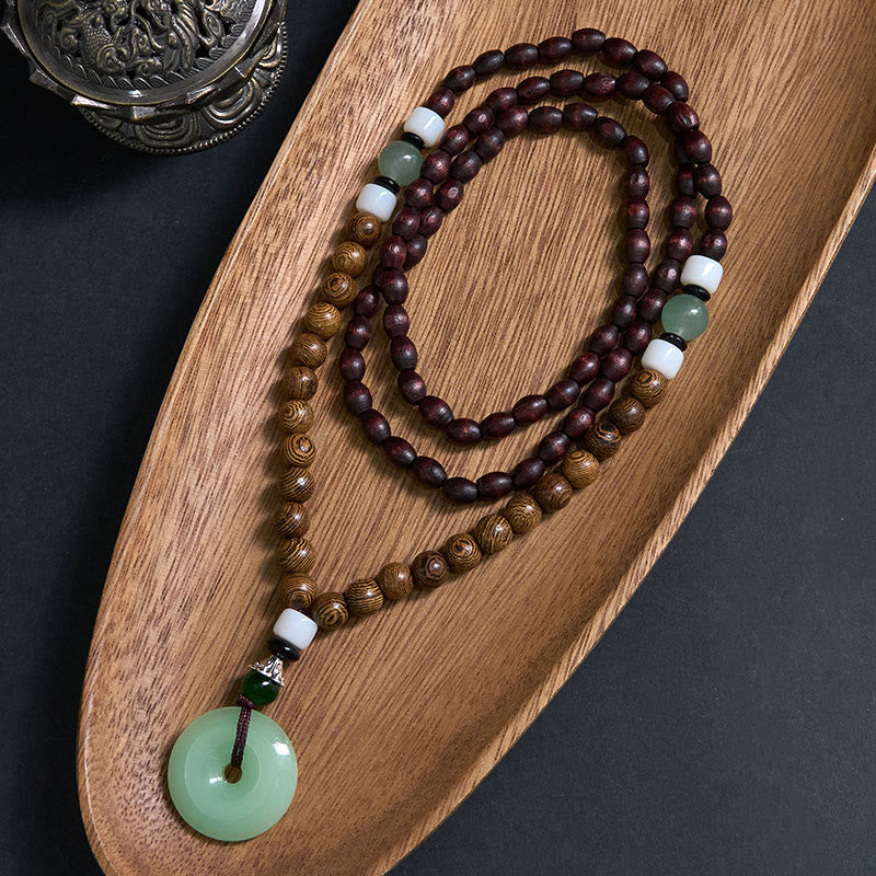 Collar con colgante de equilibrio y tranquilidad con hebilla de paz y madera de wengué y Buddha Stones - Hebilla de madera de wengué y de la paz - image 0