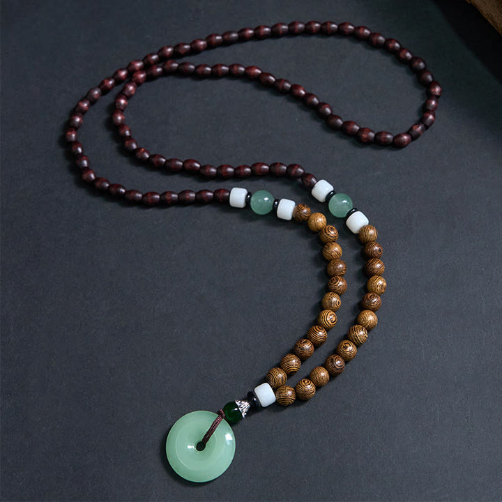Collar con colgante de equilibrio y tranquilidad con hebilla de paz y madera de wengué y Buddha Stones - image 1