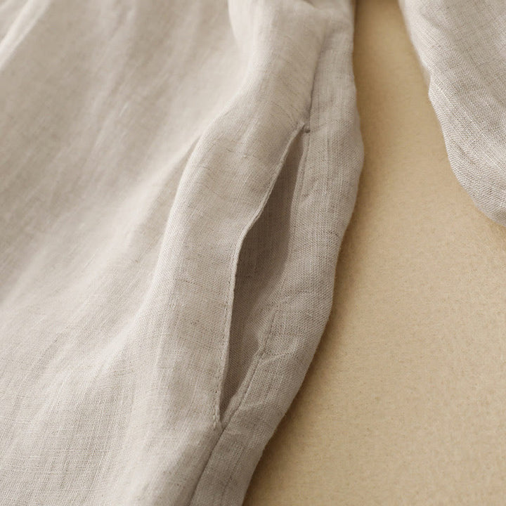 Vestido midi de algodón de manga larga con diseño de solapa, botones color beige y estampado de Buddha Stones, con bolsillos. - image 4