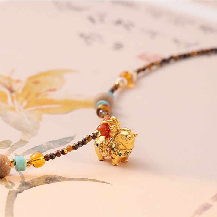 Collar con colgante de protección contra el ojo de tigre con Buddha Stones, año dorado del caballo - image 2