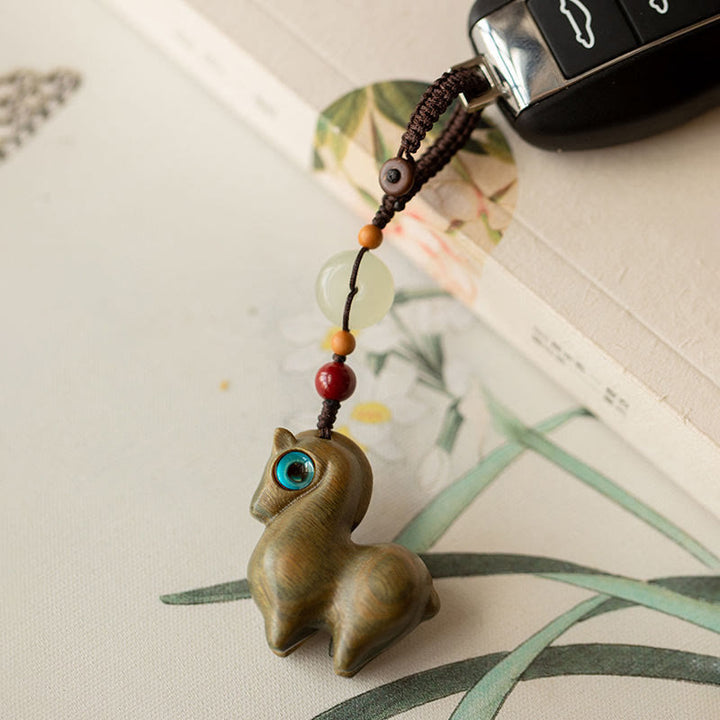 Buddha Stones Año del Caballo Hoja pequeña Sándalo rojo Sándalo verde Madera de ébano Llavero de calma - image 9