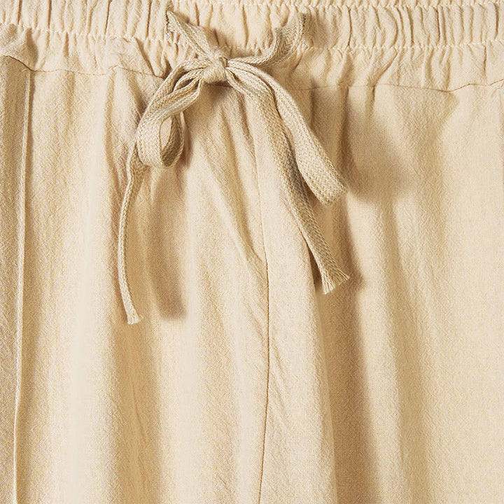 Pantalones de algodón para hombre con bolsillos y botones laterales de color liso con Buddha Stones - image 1