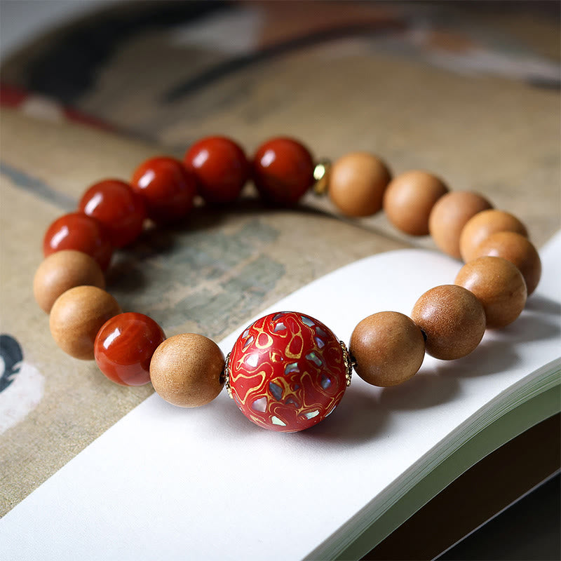 Pulsera protectora de cuentas artesanales lacadas con Buddha Stones, sándalo y ágata roja del sur - image 0