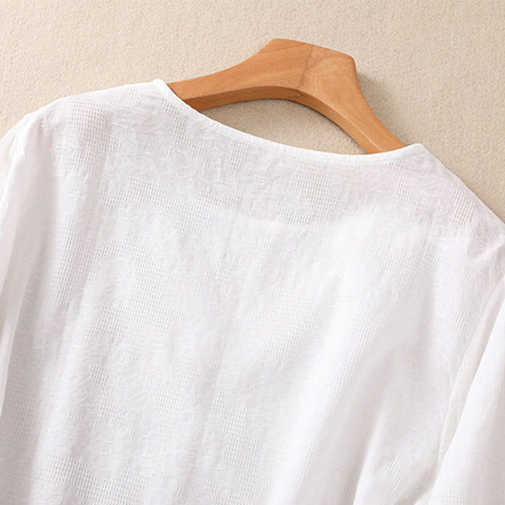 Camisa de manga larga para mujer con diseño plisado y dobladillo irregular en jacquard con Buddha Stones . - image 11