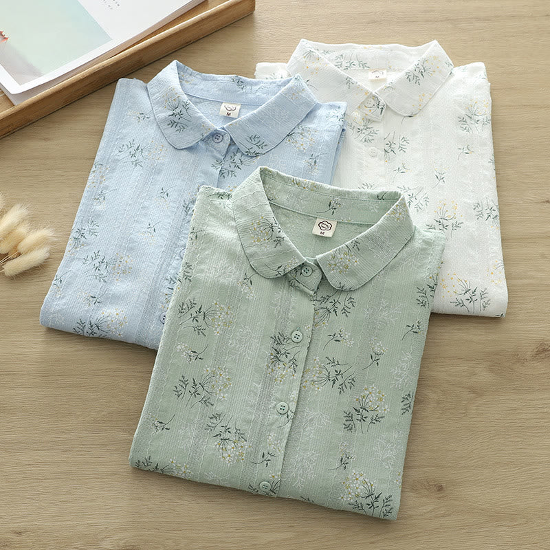 Camisa de manga larga de algodón para mujer con estampado de Buddha Stones, flores blancas y amarillas, hojas verdes y botones. - image 0