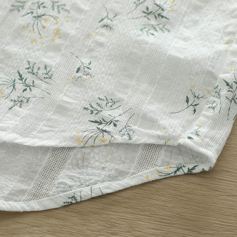 Camisa de manga larga de algodón para mujer con estampado de Buddha Stones, flores blancas y amarillas, hojas verdes y botones. - image 9