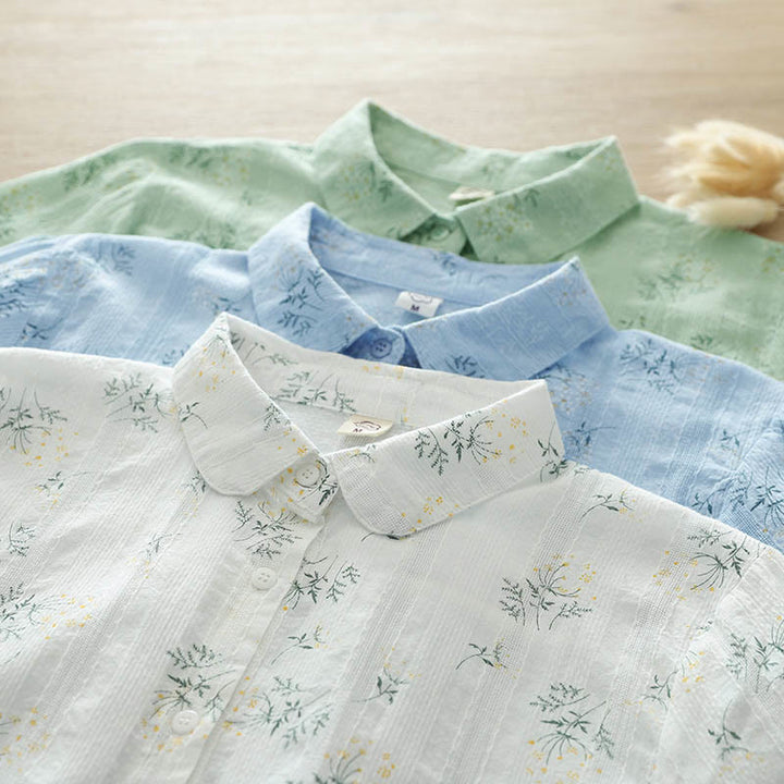 Camisa de manga larga de algodón para mujer con estampado de Buddha Stones, flores blancas y amarillas, hojas verdes y botones. - image 15